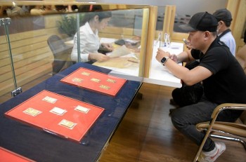 ngan hang nha nuoc tiep tuc ha gia ban vang mieng sjc