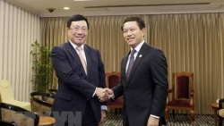 viet nam lao trao doi nhieu van de quoc te