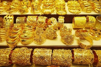 anh huong cua bom no evergrande gia vang the gioi da tang tro lai