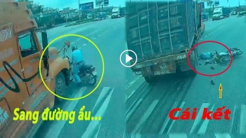 camera giao thong tat dau xe container nguoi dan ong bi huc vang xuong duong