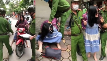 nguoi phu nu khong doi mu bao hiem la het chui boi va can canh sat