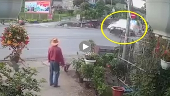 xe tai bi lat sau pha phanh gap danh lai tranh xe may sang duong