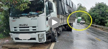 vuot au khi troi mua xe tai gay hoa cho xe bon
