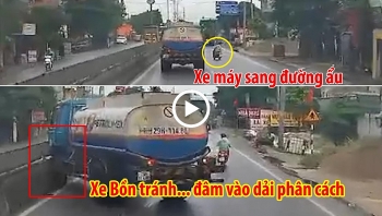 tranh xe may chuyen lan au xe bon xang dau dam vao dai phan cach