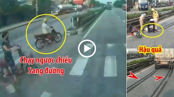 chay xe may nguoc chieu khi sang duong nguoi phu nu bi container tong bat tinh