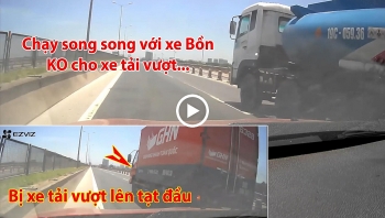 di song song voi xe bon tren cau oto con bi xe tai tat dau vi khong chiu nhuong duong