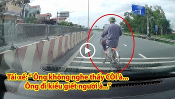 cu ong di xe sang duong khong quan sat khien tai xe o to phai dung lai nhuong duong