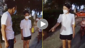 nguoi phu nu cai co nhat quyet khong chiu sat khuan khi ra vao chung cu