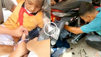 nguoi dan cung nhau giai cuu be gai bi cuon vao banh xe may do vuong ao chong nang