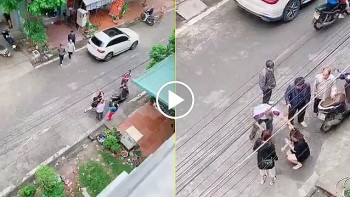 phan no hinh anh nguoi dan ong danh phu nu giua duong
