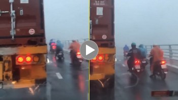 nang luong tich cuc tai xe lai container di cham chan gio cho xe may