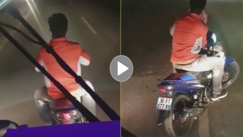 nam thanh nien chan xe dap vo kinh o to tren duong