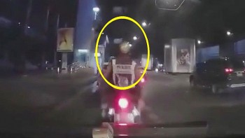 say ruou nu tai xe tong vang hai canh sat di xe may