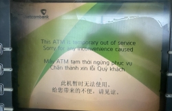 ngan hang nha nuoc ra cong dien khan yeu cau phat hien va tiep quy doi voi atm het tien dip tet