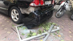 Cửa kính chung cư rơi trúng ô tô, nhiều người uống trà đá may mắn thoát nạn