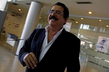 Bị tạm giữ vì mang 18.000 USD trong hành lý, cựu tổng thống Honduras than phiền "thật bất công"