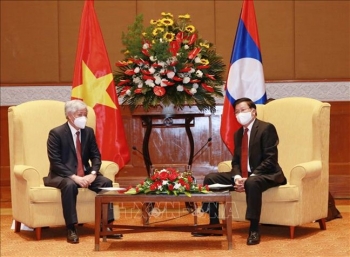 Tổng Bí thư, Chủ tịch nước Thongloun Sisoulith ghi nhận đóng góp, hy sinh của đội ngũ chuyên gia và quân tình nguyện Việt Nam