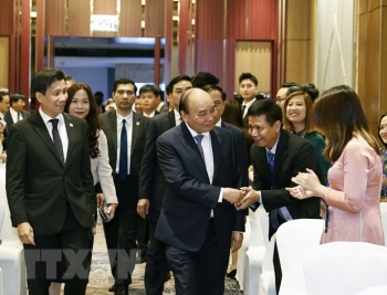 chu tich nuoc nguyen xuan phuc gap go kieu bao viet nam tai indonesia