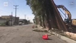video buc tuong bien gioi my mexico cua tong thong trump bi gio quat xieu veo