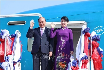 Chủ tịch nước Nguyễn Xuân Phúc đến Vientiane, bắt đầu thăm hữu nghị chính thức CHDCND Lào