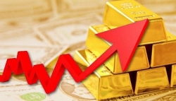 Giá vàng tuần qua tăng cao, chạm mốc lịch sử 1.450 USD/ounce