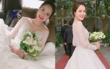 a hau hoang anh rang ro voi vay trang tinh khoi trong tiec cuoi