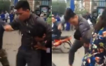 ha noi va cham giao thong tai xe oto bi 2 thanh nien nam dau danh tui bui