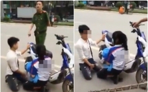 thanh nien quy goi giua duong xin cong an tha xe cho nguoi yeu