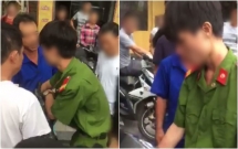 cong an xac minh thanh nien mac quan phuc khong deo bien ten bi nguoi dan vay danh khi bat xe vi pham