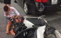 ha noi nam thanh nien dam nat duoi xe oto vi mot tay om cho mot tay dieu khien xe may