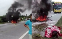 thai binh va cham voi xe khach nguoi phu nu cung chiec xe may boc chay du doi tren duong