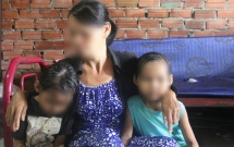 vu hai be gai song sinh 6 tuoi nghi bi hang xom xam hai quyet dinh tam dinh chi dieu tra