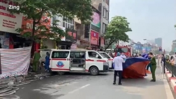 Những chuyến xe chở thi thể sau vụ cháy làm 4 người chết ở Hà Nội